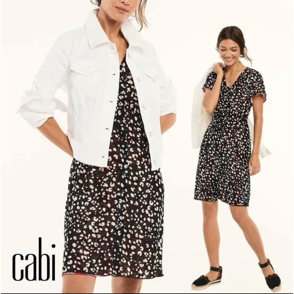 CAbi Gemini dress.  Reversible one side black other side is red.
